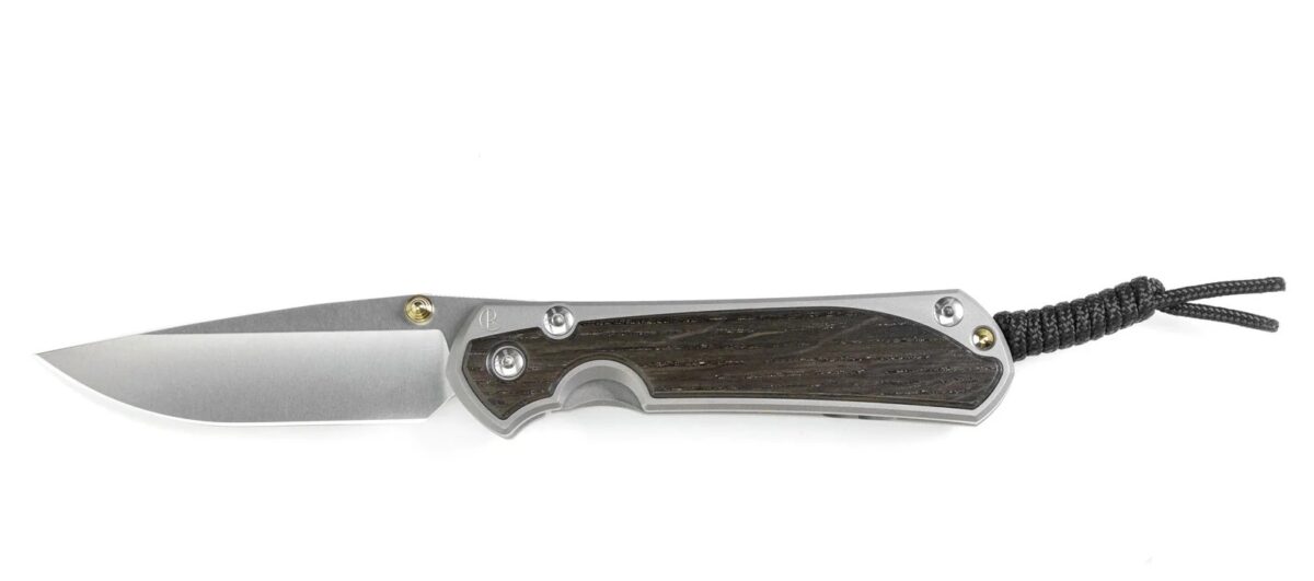 Chris Reeve Large Sebenza 31 Bog Oak Magnacut. folder frame lock right